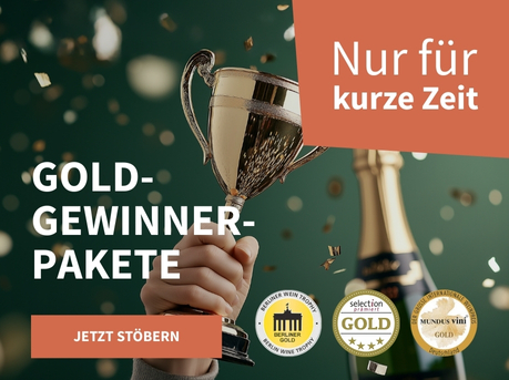 Meravino Weinaktion mit dem Slogan "Gold-Gewinner-Pakete". Dunkelgrüner Hintergrund mit goldenem Konfetti, davor eine Flasche Champagner und ein goldener Pokal. Hinweis auf "Nur für kurze Zeit". Unten Button "Jetzt stöbern". Rechts drei Plaketten.