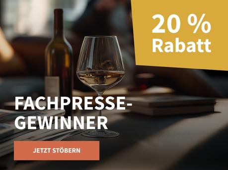 Meravino Weinaktion mit dem Slogan "Fachpresse-Gewinner". Im Hintergrund ein Wohnzimmertisch, auf dem Zeitungen liegen, daneben eine Flasche Wein und ein Weinglas. Hinweis auf "20 % Rabatt". Unten Button "Jetzt stöbern".