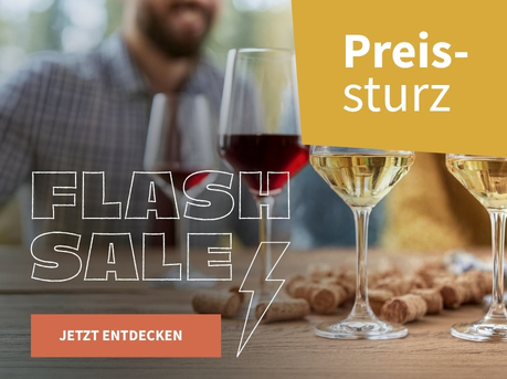 Meravino Weinaktion mit dem Slogan "Flash Sale". Im Hintergrund mehrere Gläser Wein und Korken auf einem Holztisch, an dem zwei Personen sitzen. Hinweis auf "Preissturz". Unten Button "Jetzt entdecken".